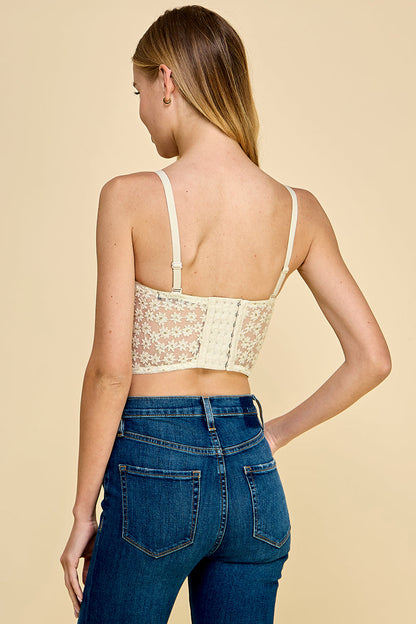 Bustier de encaje con bordado de margaritas