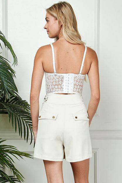 Bustier de encaje con bordado de margaritas